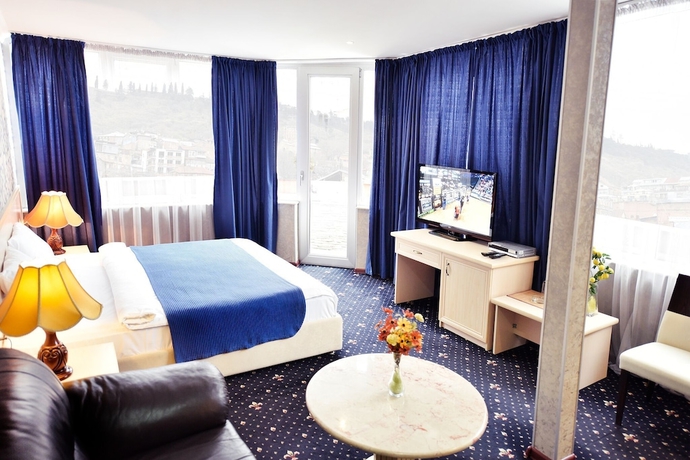 Imagen de la habitación del Hotel Sharden. Foto 13