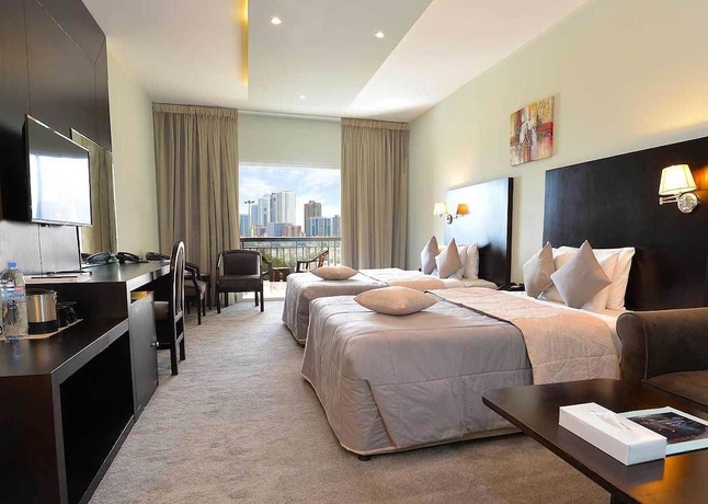 Imagen de la habitación del Hotel Sharjah Carlton. Foto 6