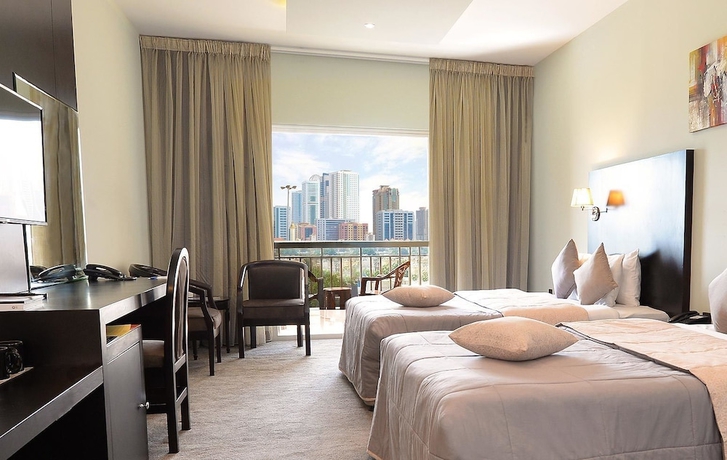 Imagen de la habitación del Hotel Sharjah Carlton. Foto 7