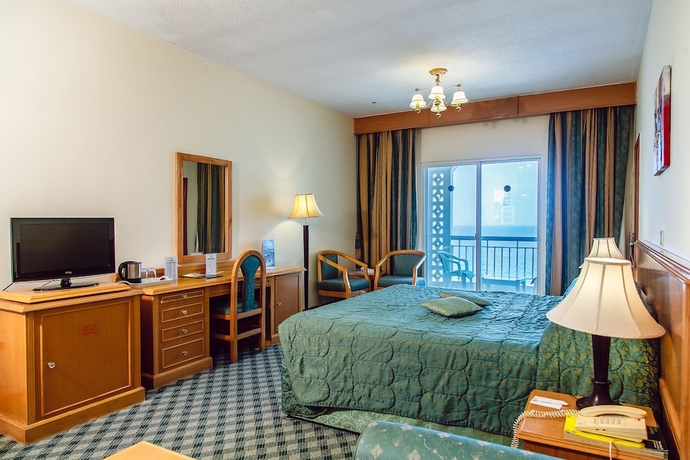 Imagen de la habitación del Hotel Sharjah Carlton. Foto 8