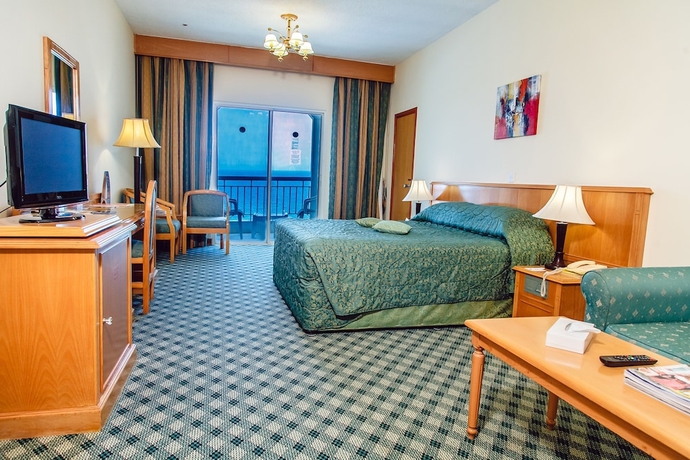 Imagen de la habitación del Hotel Sharjah Carlton. Foto 9