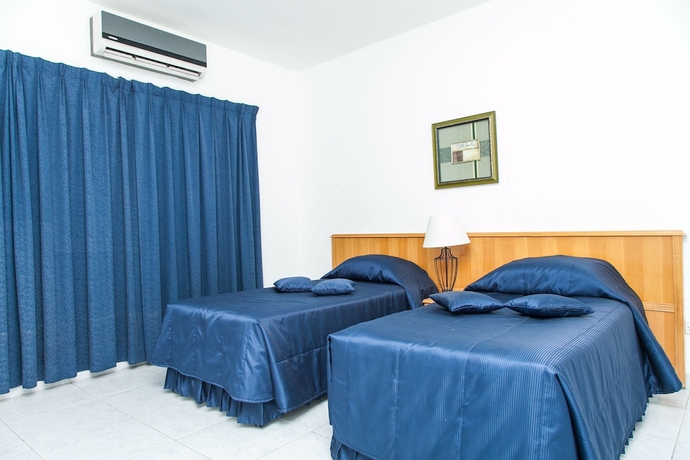 Imagen de la habitación del Hotel Sharjah Carlton. Foto 11