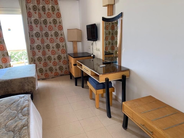 Imagen de la habitación del Hotel Sharm El Naga Resort and Diving Center. Foto 15
