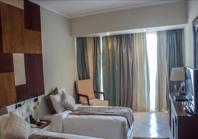 Imagen de la habitación del Hotel Sharming Inn. Foto 5