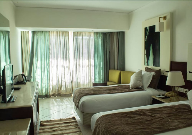 Imagen de la habitación del Hotel Sharming Inn. Foto 6