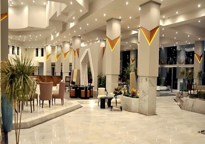 Imagen de los interiores del Hotel Sharming Inn. Foto 17