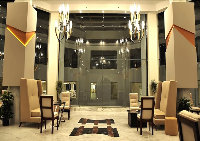 Imagen del bar/restaurante del Hotel Sharming Inn. Foto 4