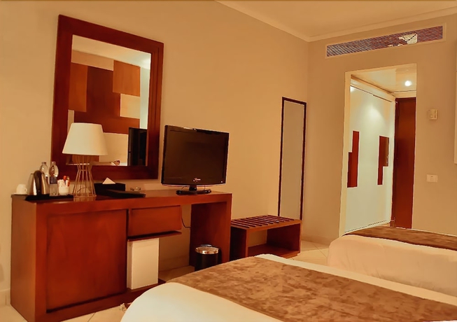 Imagen de la habitación del Hotel Sharming Inn. Foto 7