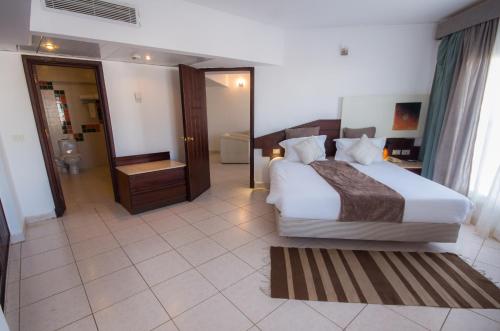 Imagen de la habitación del Hotel Sharming Inns - Couples and Families Only. Foto 19