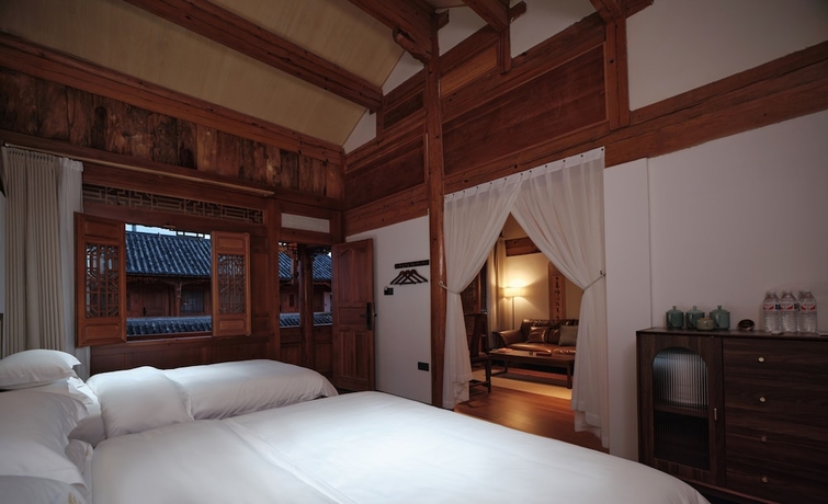 Imagen de la habitación del Hotel Shaxi Ancient Town Chang Le Li Chinese Courtyard. Foto 4