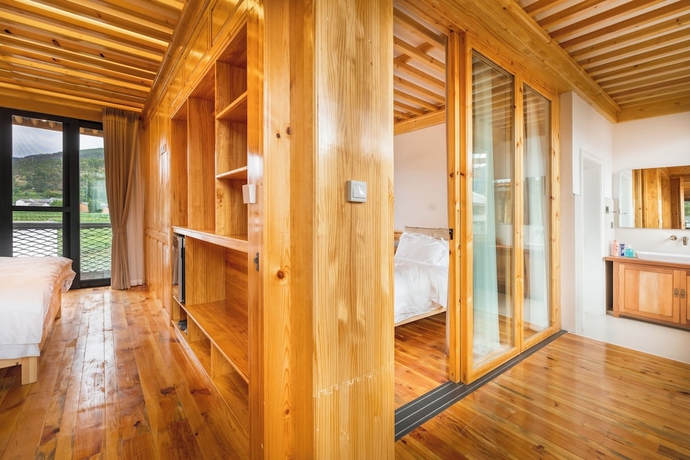 Imagen de la habitación del Hotel Shaxi Upstay. Foto 2