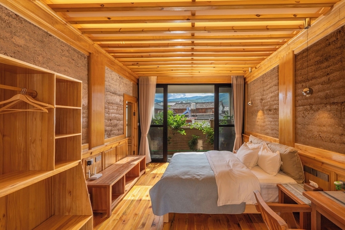 Imagen de la habitación del Hotel Shaxi Upstay. Foto 4