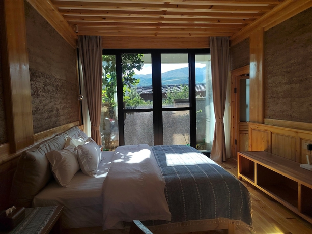 Imagen de la habitación del Hotel Shaxi Upstay. Foto 5