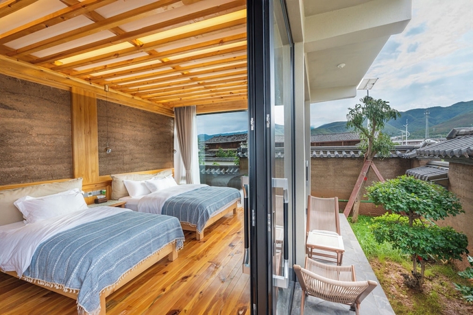 Imagen de la habitación del Hotel Shaxi Upstay. Foto 6