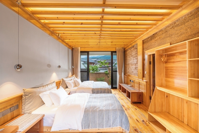 Imagen de la habitación del Hotel Shaxi Upstay. Foto 7