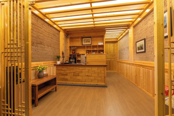Imagen de los interiores del Hotel Shaxi Upstay. Foto 16