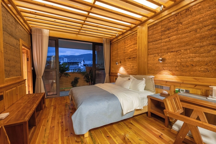 Imagen de la habitación del Hotel Shaxi Upstay. Foto 9