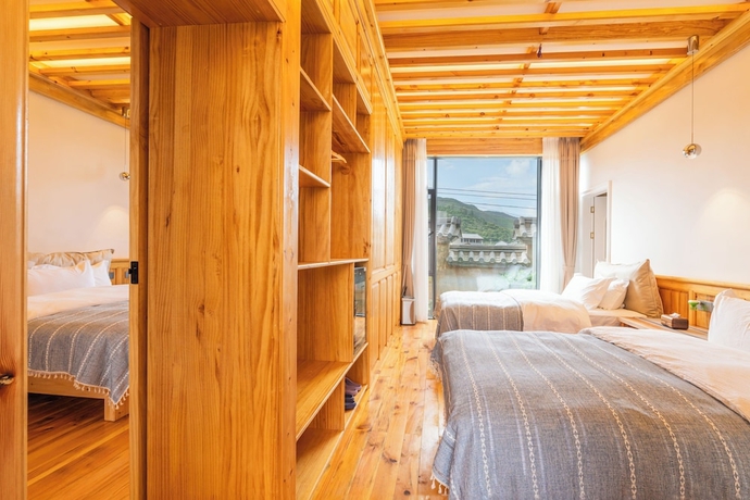 Imagen de la habitación del Hotel Shaxi Upstay. Foto 11