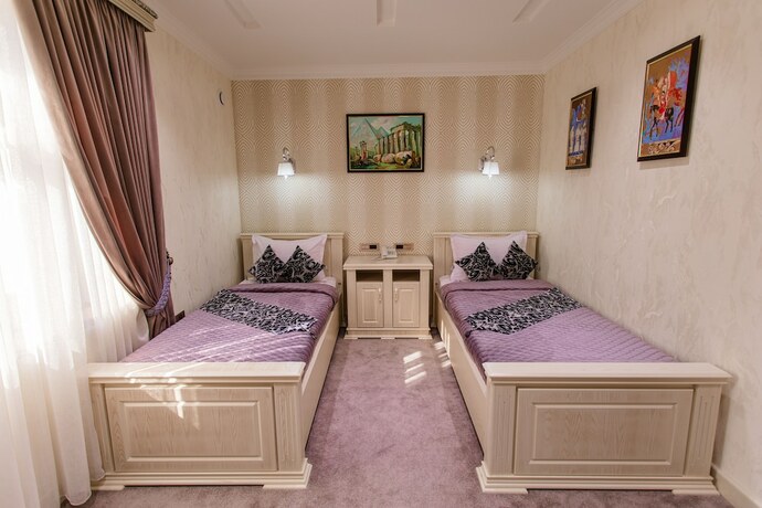 Imagen de la habitación del Hotel Shaxzoda Elite. Foto 19