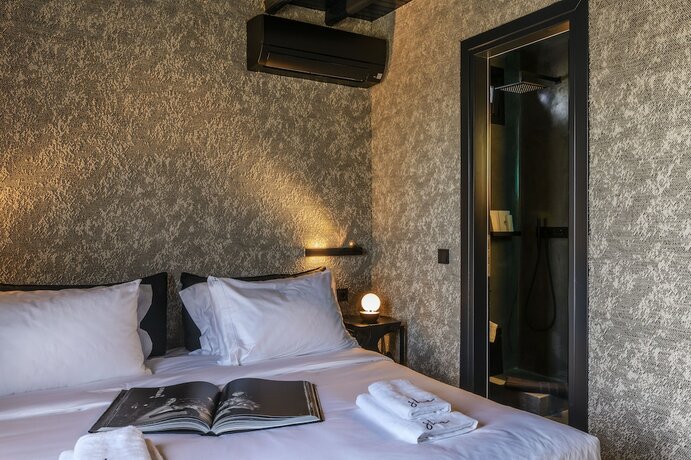 Imagen de la habitación del Hotel She Mykonos. Foto 16