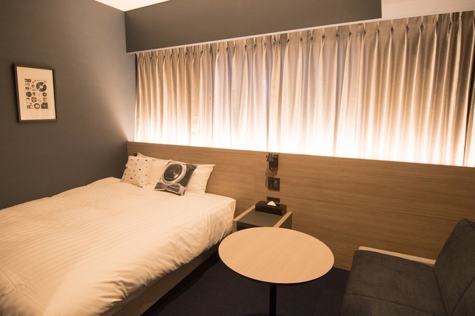 Imagen de la habitación del Hotel She, Osaka. Foto 15