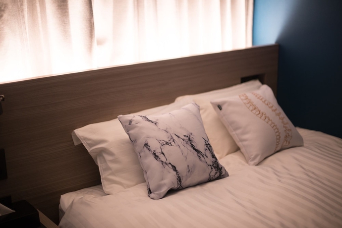 Imagen de la habitación del Hotel She, Osaka. Foto 17