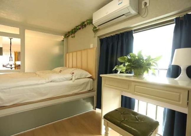 Imagen de la habitación del Hotel Sheandhe Apartment Shenzhen University. Foto 16