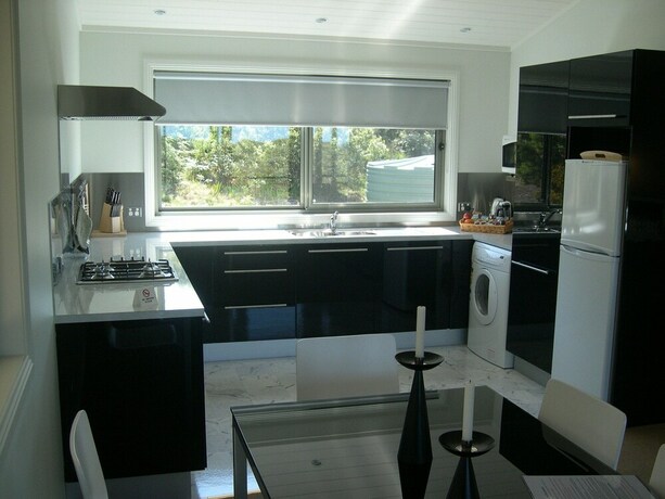 Imagen de la habitación del Hotel Shearwater Cottages. Foto 15