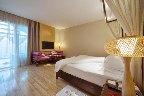 Imagen de la habitación del Hotel Sheenjoy Chongqing. Foto 8