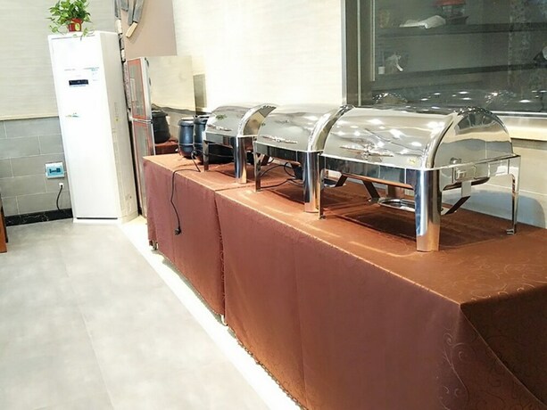 Imagen del bar/restaurante del Hotel Shell Qionghai Boao Town Binhai Road Hotel. Foto 22