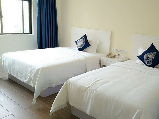 Imagen de la habitación del Hotel Shell Qionghai Boao Town Binhai Road Hotel. Foto 26