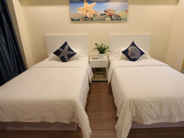 Imagen de la habitación del Hotel Shell Qionghai Boao Town Binhai Road Hotel. Foto 30