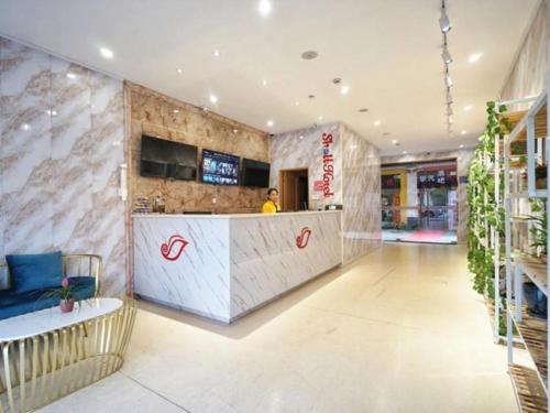 Imagen general del Hotel Shell Shanghai Baoshan District Songbin Road Subway Station. Foto 3