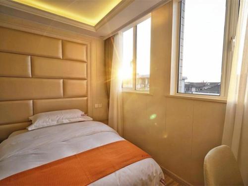 Imagen general del Hotel Shell Shanghai Baoshan District Songbin Road Subway Station. Foto 12