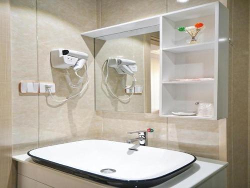 Imagen general del Hotel Shell Shanghai Baoshan District Songbin Road Subway Station. Foto 13