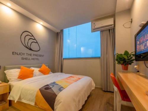 Imagen general del Hotel Shell Suzhou Zhangjiagang Jingang Town Central Plaza. Foto 2