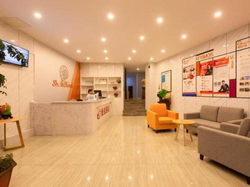 Imagen general del Hotel Shell Suzhou Zhangjiagang Jingang Town Central Plaza. Foto 4