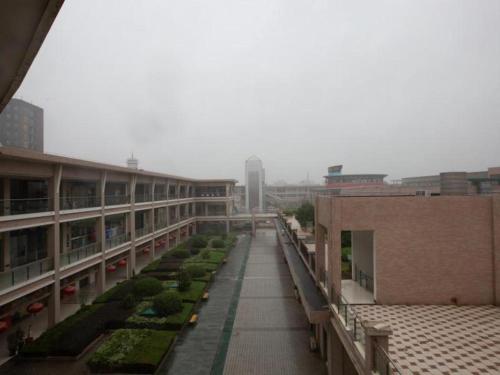 Imagen general del Hotel Shell Suzhou Zhangjiagang Jingang Town Central Plaza. Foto 6