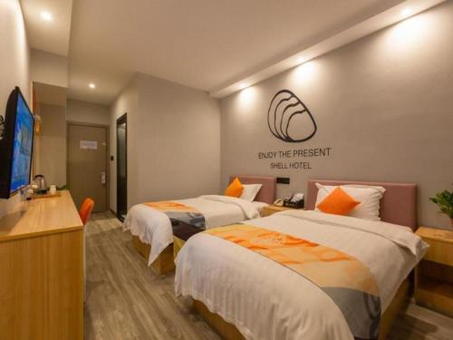 Imagen general del Hotel Shell Suzhou Zhangjiagang Jingang Town Central Plaza. Foto 10