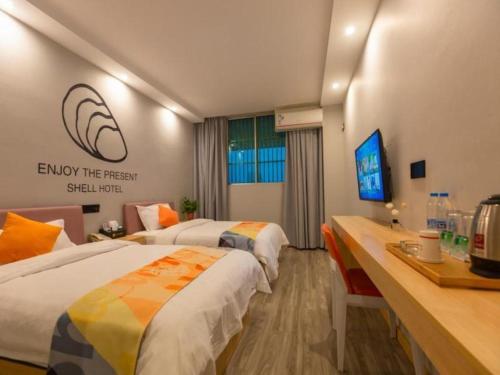 Imagen general del Hotel Shell Suzhou Zhangjiagang Jingang Town Central Plaza. Foto 16