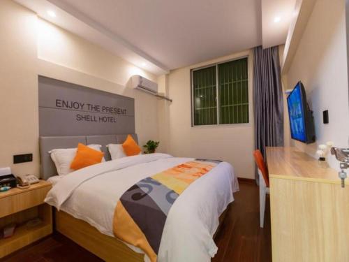 Imagen general del Hotel Shell Suzhou Zhangjiagang Jingang Town Central Plaza. Foto 18
