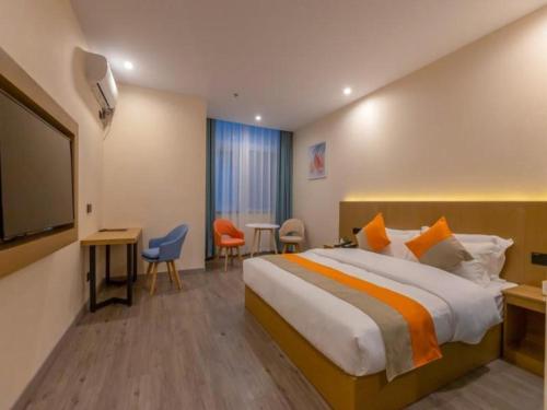 Imagen general del Hotel Shell Wuxi Gonghu Avenue Vientiane City. Foto 2