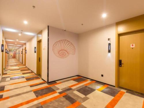 Imagen general del Hotel Shell Wuxi Gonghu Avenue Vientiane City. Foto 6