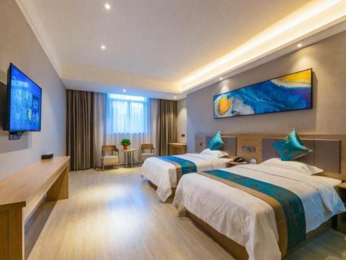 Imagen general del Hotel Shell Zhenjiang Danyang Baibaiban People Square. Foto 2