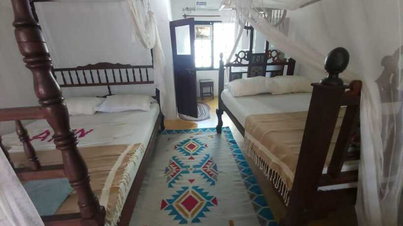 Imagen de la habitación del Hotel Shella Bahari Guest House. Foto 12