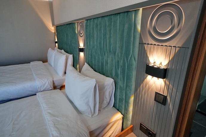 Imagen de la habitación del Hotel Shelton Airport Otel. Foto 14