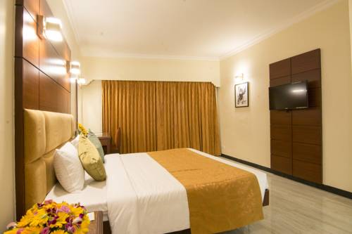 Imagen de la habitación del Hotel Shenbaga and Convention Centre. Foto 2
