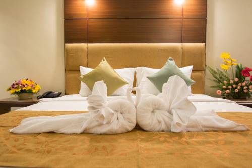 Imagen de la habitación del Hotel Shenbaga and Convention Centre. Foto 5