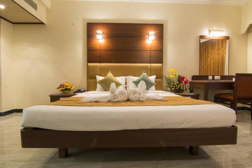 Imagen de la habitación del Hotel Shenbaga and Convention Centre. Foto 6