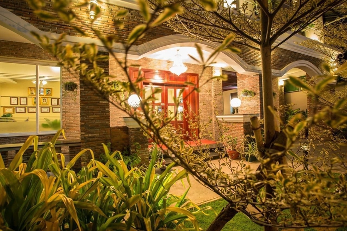Imagen de los exteriores del Hotel Sheng Hang Xin Villa. Foto 9